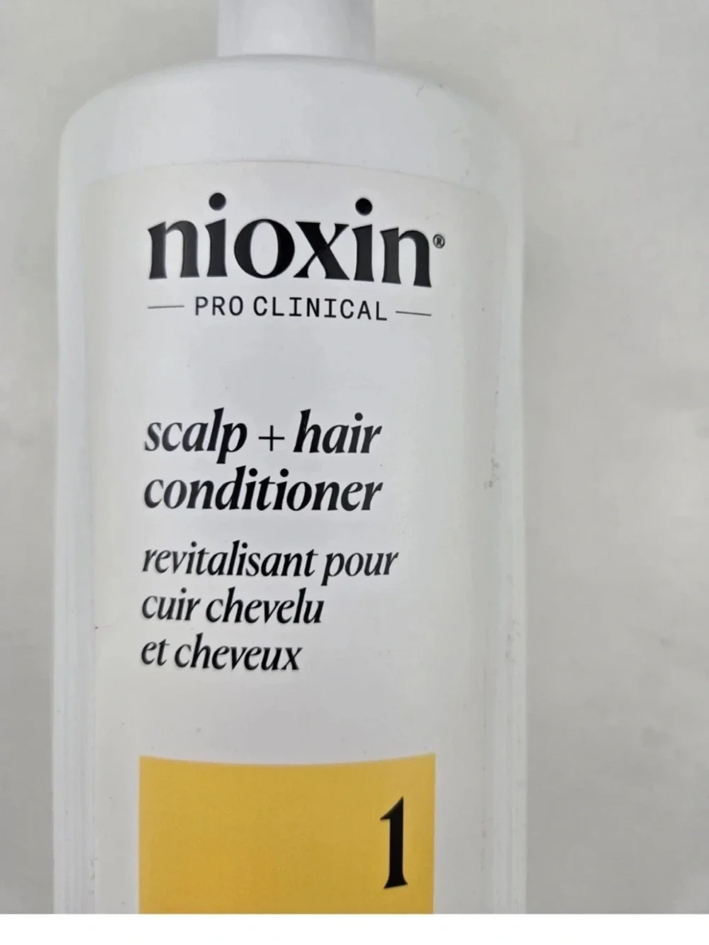 Nioxin Scalp + Hair Conditioner System 1 — White with Yellow Label